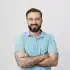 handsome-confident-smiling-man-with-hands-crossed-chest_176420-18743